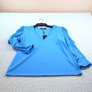 Karl Lagerfeld Light Blue V-Neck Blouse Open Shoulder. 100% Polyester. Medium
